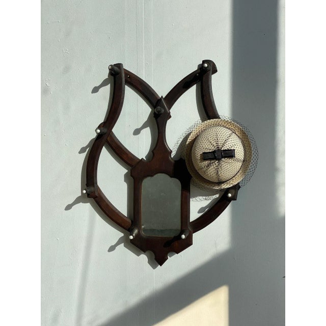 Rare Antique Victorian Folding Walnut Wall Rack with Mirror, Circa Mid-Late 19th Century. A rare folding wall rack, this...