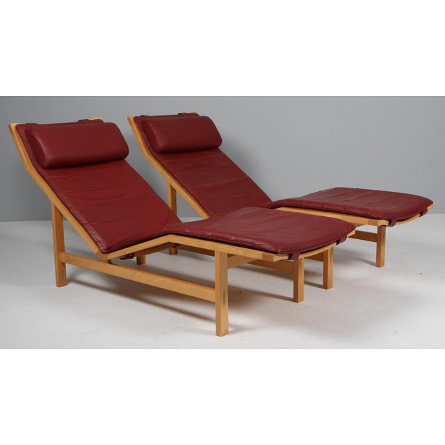 Rud Thygesen & Johnny Sørensen chaiselongs with frame of beech. Cane in the back and seat, original redleather seat...