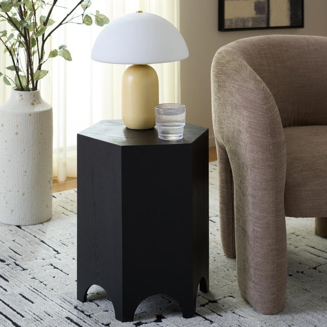 Introducing the Barahan End Table. A stylish and practical addition to your space. Crafted from durable wood in a sleek...
