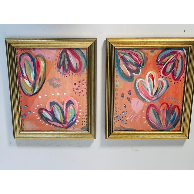 Charming pair of colorful abstract paintings- acrylic on paper, signed by the artist, framed in gold frames.