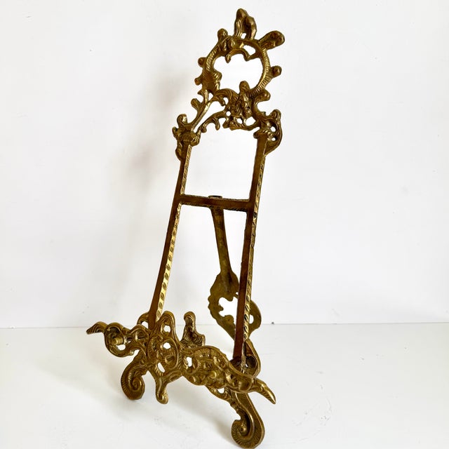 Beautiful ornate Victorian or Baroque style brass easel standing 15" tall! The kickstand back folds for storage. Suitable...