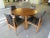Mid Century Modern Stylized Dining Table With 3 Leaves and 4 Chairs sold as found in vintage condition unrestored but in...