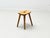 Swiss Wooden Quadripod Stool made of Pinewood This Swiss Wooden Quadripod Stool from the 1960s is an authentic example of...