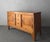 Beautiful handcrafted 1950's pine buffet oozes warmth and comfort. The hand carved trim details and beautiful patinaed...