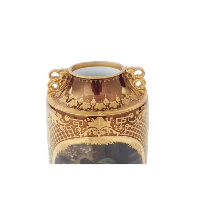 19th Century Royal Vienna gilt gold porcelain decorative vase / piece with exterior design details. The vase / piece was...