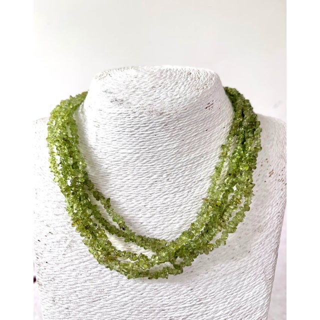 Lovely, vintage sterling silver and Peridot multi strand beaded necklace.