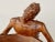The artist who rendered this artfully carved wooden ashtray certainly has shown empathy toward his subject. The woman’s...