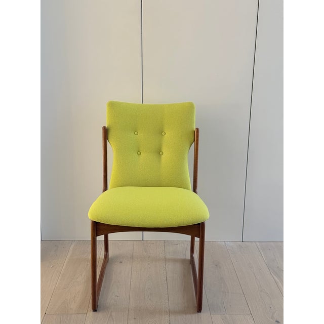 A matched set of four Danish dining chairs made by Vamdrup Stolefabrik in the 1960s, newly reupholstered in a Maharam...