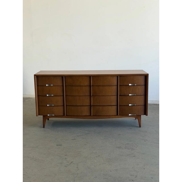 W66 D20 H33 Fully refinished American of Martinsville Dresser with original hardware. With 12 drawers and additional...