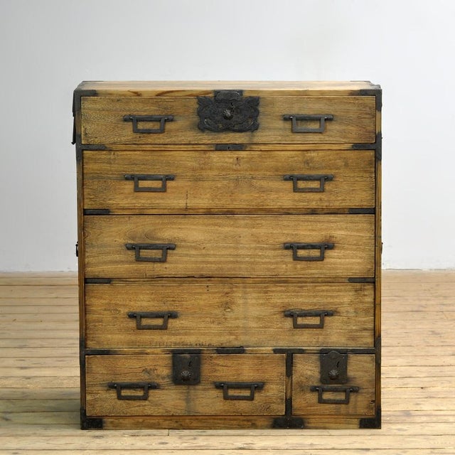 Traditional Japanese Tansu chest of drawers from the 1870s. Manufactured during the late Meiji era (1868-1912). This piece...