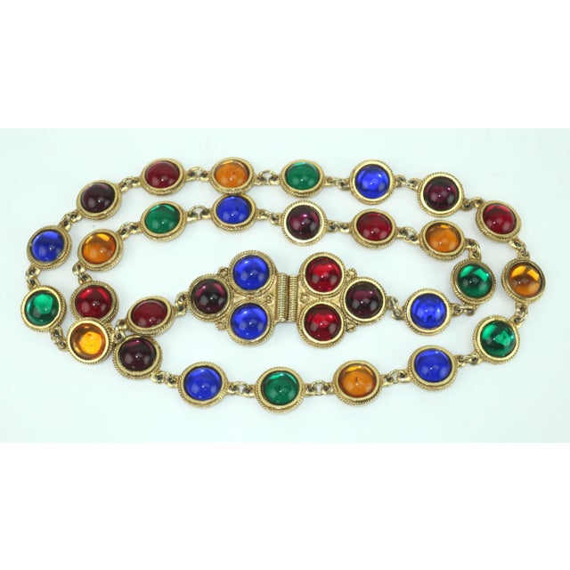 Bedazzled and bejeweled! It is easy to get the ultra chic look when adding a colorful chain belt by Accessocraft NYC. The...