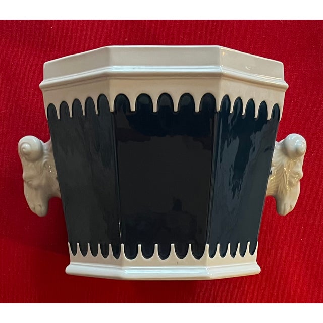 Italian Mancioli Mid-Century Modern ceramic cachepot planter with ram's head handles. Flared octagonal shape with deep...