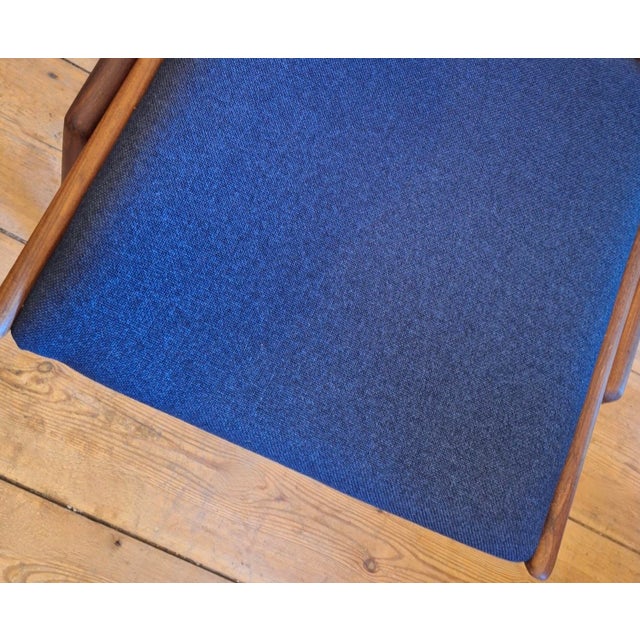 Finely constructed set of Danish dining chairs in solid teak, seats and backs recently re-covered with blue structured...