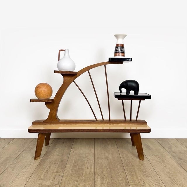 Here's a superb, must-have piece of furniture for any 1950s decor\. This plant stand, with its bold design, colors, and...