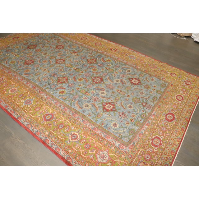 An early 20th-century Persian Mahal Rug highlighted by a sky blue field Details rug no. j4619 size 7' 8" x 12' 1" (234 x...
