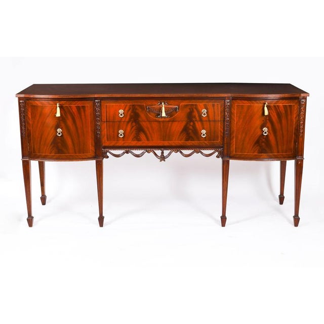 This is an elegantly proportioned vintage Regency Revival mahogany sideboard by the renowned retailer Maple & Co, late...