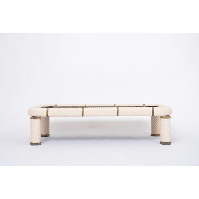 Large 1970s Tommaso Barbi White Ceramic and Brass Coffee Table Stunning coffee table designed by Tommaso Barbi. This table...