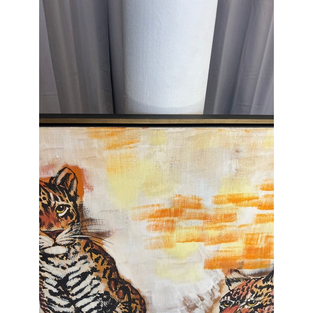 Vintage framed painting. Acylic / oil on canvas. Modernist style featuring two leopards with yellow and orange background....