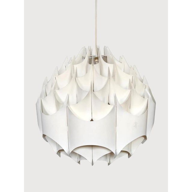 Shine bright! with this stylish designer pendant lamp designed by Havlova Milanda. Produced by Vest Leuchten. Model:...