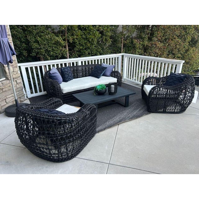 Comfortable and stylish outdoor set featuring a wicker sofa, two matching chairs, and a sturdy coffee table. Includes seat...