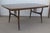 Mid century modern / Danish Modern walnut dining table by the Holman Manufacturing Co. of Pittsburg, Texas. The table has...