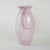 The vase was made in the 1980s, Italian production. A blown glass vase in shades of pink, with decorative streaks embedded...