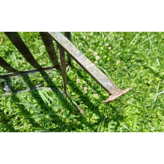 Antique 1940's Wrought Iron Patio lounge chair. On wheels. Leaf design, English style. Most likely attributed to Woodward....
