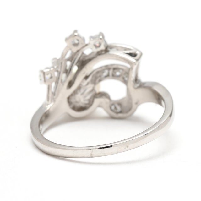 Stones: cultured pearl ,1 stone round bead 6.8 mm diamond, 12 stones round brilliant 1.75 - 2 mm approximately .25 total...