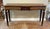 This Henkel Harris Flamed Mahogany Adams Style Console Table Model No. 5758 features a graceful bowed front, richly...