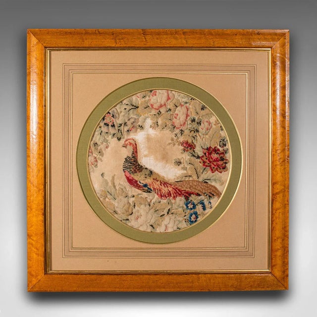 This is an antique framed needlepoint scene. An English, stump work tapestry panel, dating to the Victorian period and...