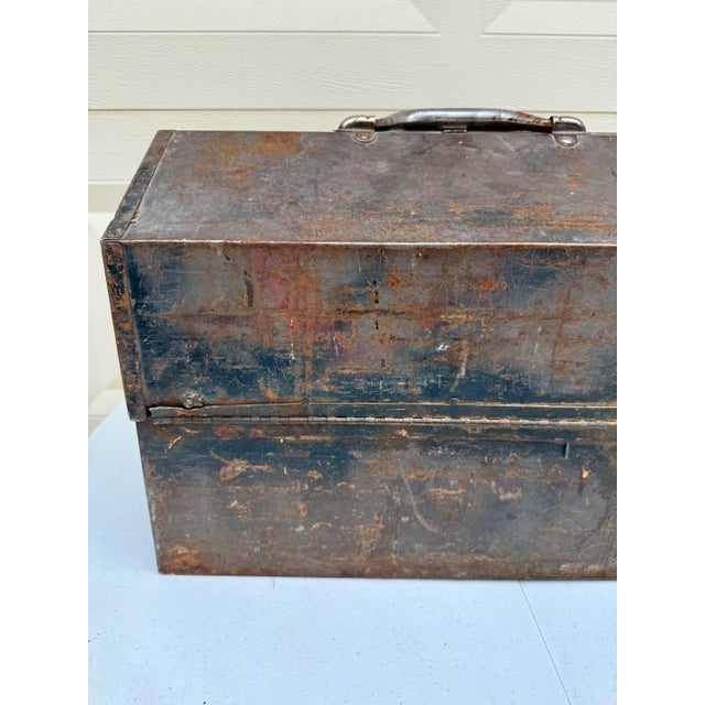 Vintage mid-century modern industrial aged toolbox. Incredible patina with many years of rust, paint, and aging...