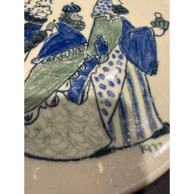Charming set of three original handmade ceramic pottery plates, individually dated 1975, 1976, and 1977. These one-of-a-...