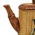 A Victorian Majolica teapot, circa 1890, featuring classic Aesthetic Movement faux-bamboo detailing. The body is styled as...