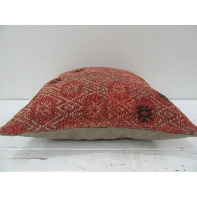 This is a pillow cover made from a vintage kilim rug. The piece was properly washed and ready to use. Pillow inserts not...