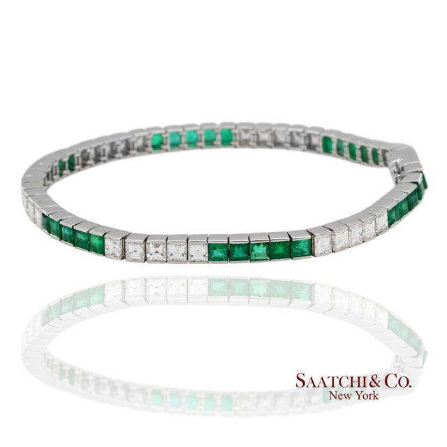 Platinum 950 Natural Diamond and Emerald Tennis Bracelet Metal Type: 950 Platinum Total Item Weight: 20.1 Grams Length:...