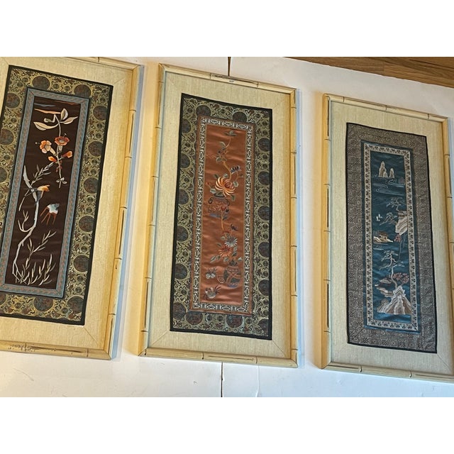Set of three antique Chinese Chinoiserie embroidered silk textile panels framed under glass. Exquisite embroidery silk on...