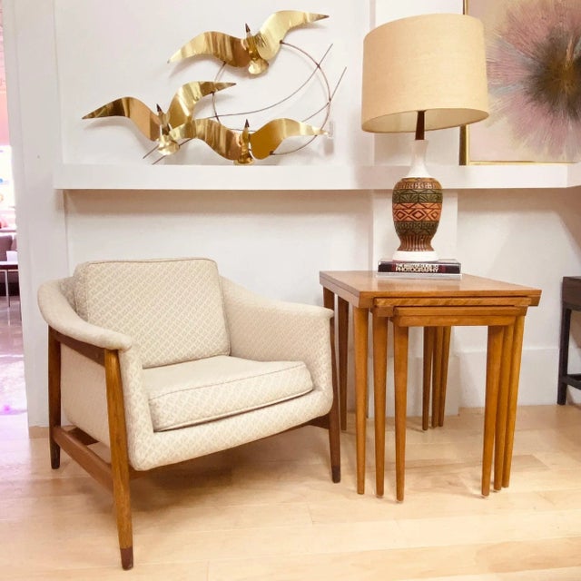 Folke Ohlsson designed lounge chair for Dux, circa 1950s, Sweden. Features a two tone cream upholstery, two removable...