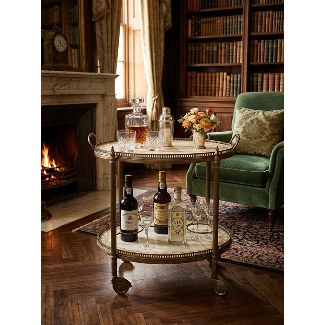 An elegant, original 1950s bar cart, a designer piece that combines the lustre of brass with the delicacy of vintage...
