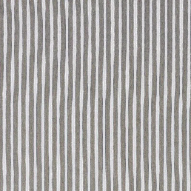 Schumacher's cotton and linen Antique Ticking Stripe is everything you want in a classic, go-to fabric: it's crisp, fresh...