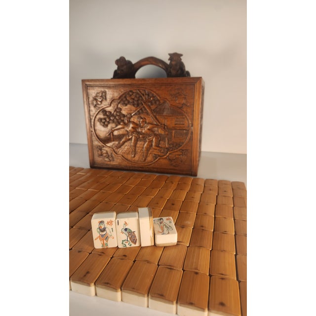 This is a one-of-a- kind 1920s antique mahjong set produced in China for the international market. It includes 144 tiles...