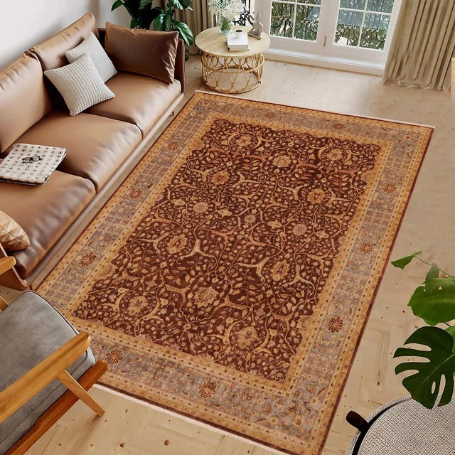 "Enhance the ambiance of your home with this magnificent Persian-influenced Turkish hand-knotted rug made by skilled...