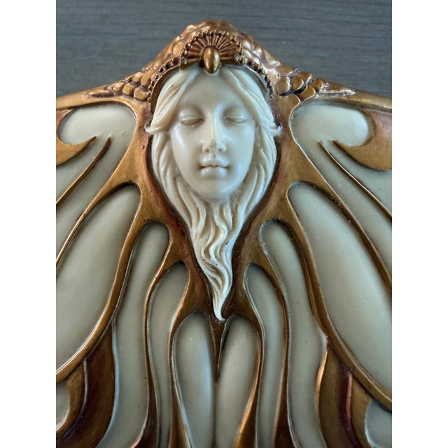 Lovely art nouveau box in the shape of a butterfly with a fairy or ladies’ face carved on the top. Not sure of the...