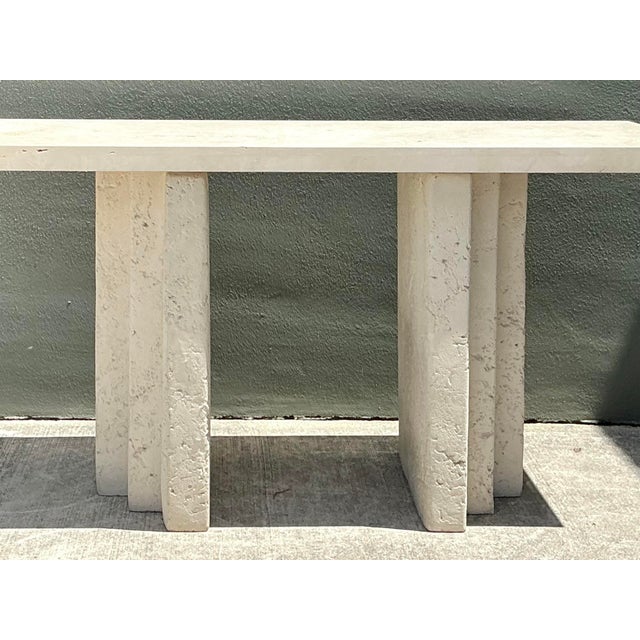 This monumental console table is a masterclass in Postmodern architectural design, seamlessly blending natural textures...