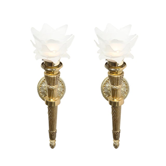 This pair of Neoclassical style sconces features a timeless torch-form design, evoking the grandeur and elegance of...