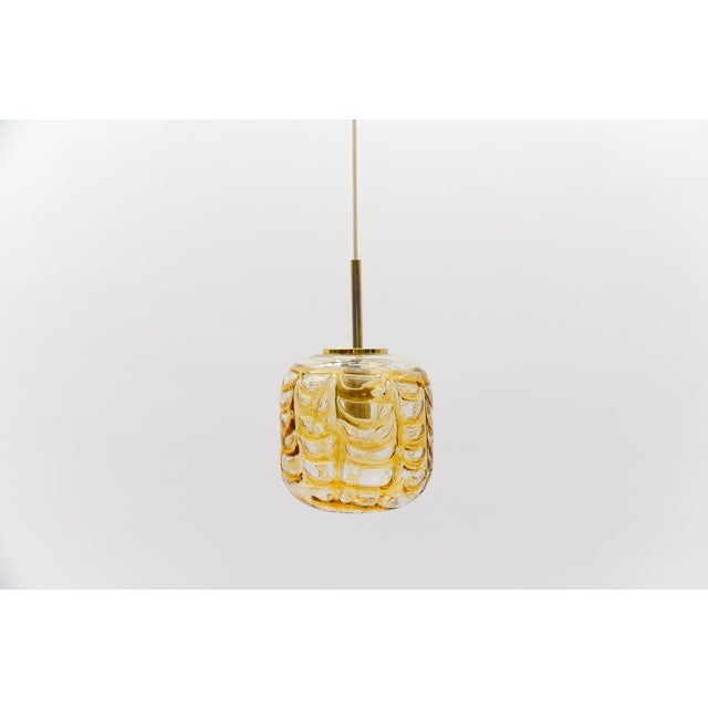 Lovely yellow murano glass ball pendant lamp from doria leuchten, germany, 1960s. the height can be adjusted from 60 cm up...