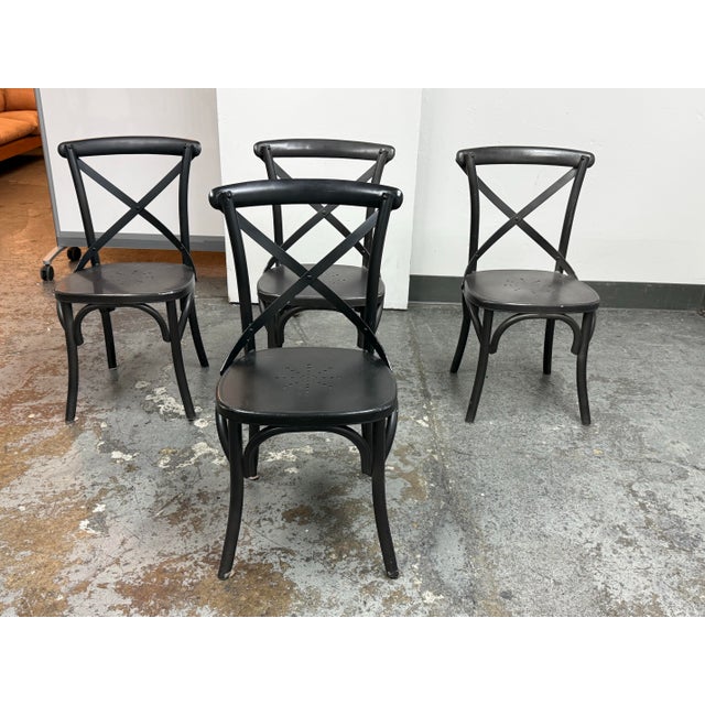 Design Plus Gallery presents a Set of Four Metal Madeleine Side Chairs from Restoration Hardware. Inspired by the café...