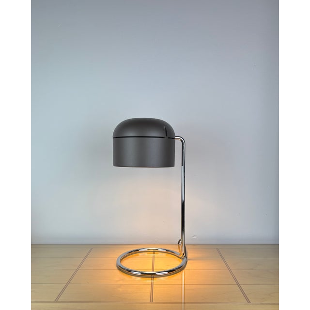 Gunmetal brown vintage table lamp designed by arnold berges for staff leuchten in germany in the 1970s. evoking the space...