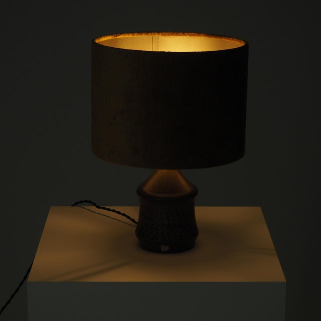 Bring authentic Scandinavian warmth into your space with this vintage mid-century ceramic table lamp by Henry Brandi...