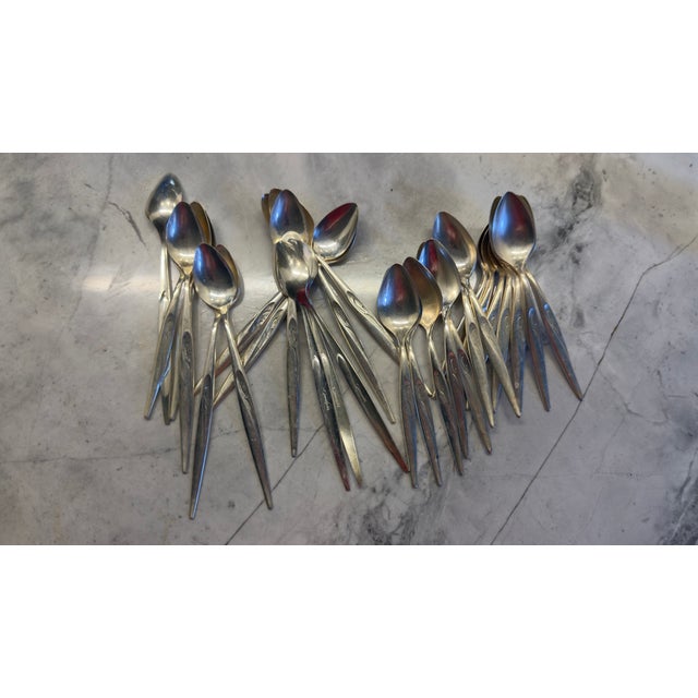 8 forks 7 very large forks 8 knives 16 spoons 12 tall spoons 6 very large spoons