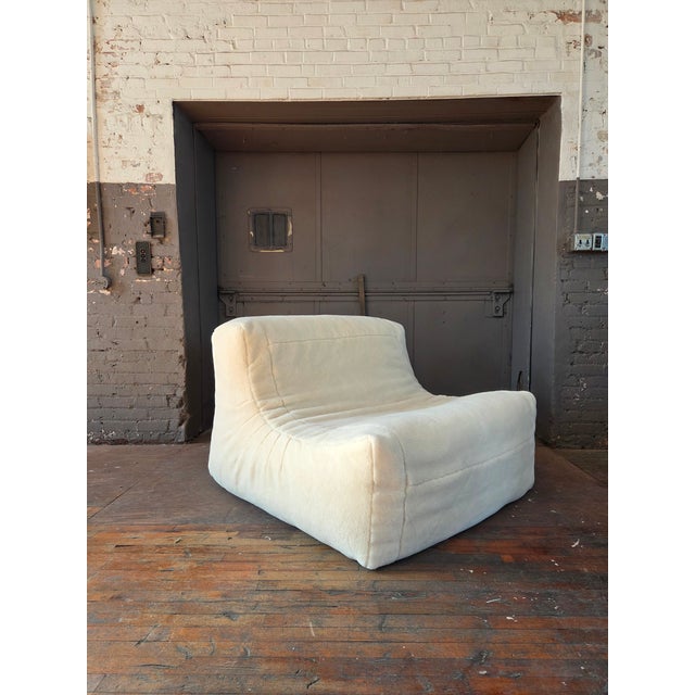 Vintage Giovanni Sforza down filled armless chair or loveseat in a brand new bespoke extra plush ivory mohair. Think Togo...